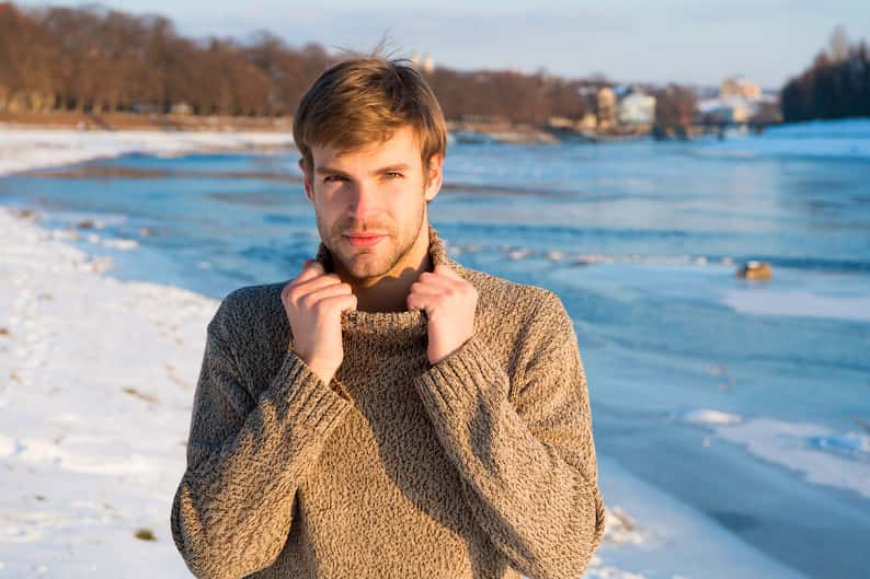 man wearing a Sweater from one of the most famous Norwegian winter clothing brands