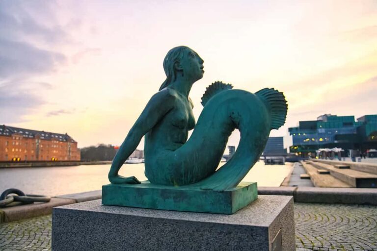 statue as an example from copenhagen of a mermaid in denmark