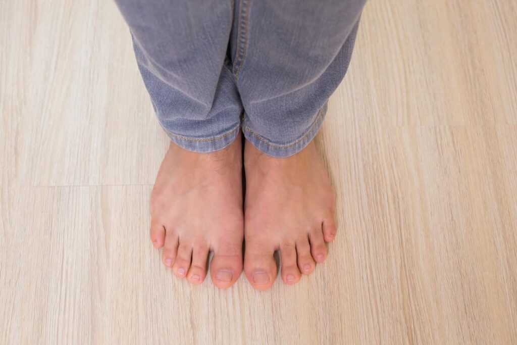 someone without a shoes inside the house which is common on life in Sweden