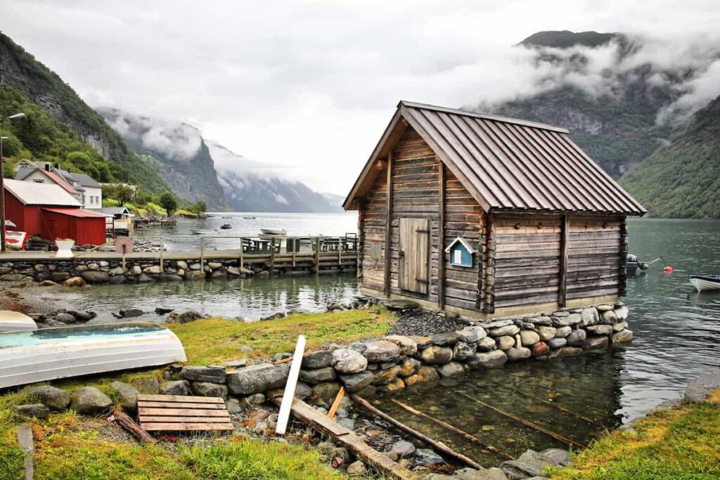 wooden house beside the fjord in Undredal Norway